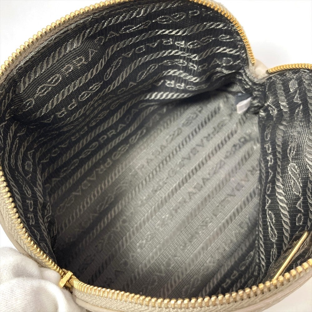 プラダ PRADA ポーチ レザー グレー ゴールド金具【中古】 | ゴールド