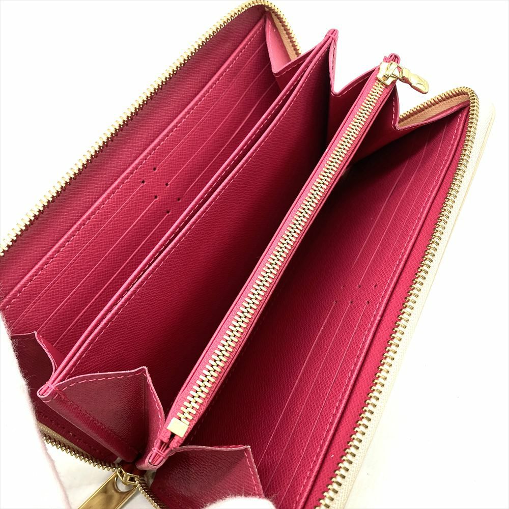 ルイヴィトン LOUIS VUITTON スタッズ ジッピーウォレット 長財布