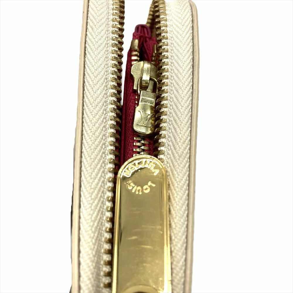 ルイヴィトン LOUIS VUITTON スタッズ ジッピーウォレット 長財布
